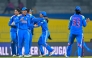 India's players celebrate after the dismissal of Pakistan's Muneeba Ali during the ICC Women's Cricket World Cup 2025 one-day international (ODI) match between India and Pakistan at the R. Premadasa International Cricket Stadium in Colombo on October 5, 2025. (Photo by Ishara S Kodikara / AFP)
