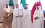 Minister of Awqaf and Islamic Affairs H E Ghanem bin Shaheen bin Ghanem Al-Ghanim (first right) looks on as Undersecretary of the Ministry of Awqaf and Islamic Affairs Dr. Sheikh Khalid bin Mohammed bin Ghanem Al Thani is honoured by Minister of Awqaf and Islamic Affairs of Kuwait H E Dr. Mohammed Ibrahim Al Wasmi. 