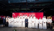 Officials pose for a photograph following a press conference held in connection with the launch of Polo AlMarsa Qatar, the country’s first ever polo showcase.