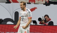 Bayern Munich's English forward #09 Harry Kane celebrates scoring his team's second goal during the German first division Bundesliga football match between Eintracht Frankfurt and FC Bayern Munich in Frankfurt am Main, western Germany, on October 4, 2025. (Photo by Daniel ROLAND / AFP)