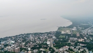 This aerial photograph taken on September 22, 2025, shows a general view of river Padma shrouded in mist at Rajshahi. (Photo by Munir Uz Zaman / AFP) 
