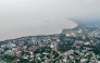 This aerial photograph taken on September 22, 2025, shows a general view of river Padma shrouded in mist at Rajshahi. (Photo by Munir Uz Zaman / AFP) 
