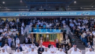 Minister of Public Health H E Mansour bin Ibrahim bin Saad Al Mahmoud (centre)  and other officials at the opening session of the conference yesterday.  