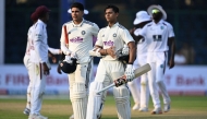India's Yashasvi Jaiswal (R) and captain Shubman Gill walk back to the pavilion at the end of the first day's play in New Delhi on October 10, 2025. (Photo by Sajjad Hussain / AFP) 