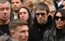 Oasis frontman Liam Gallagher (2R) arrives to attend the funeral of late British boxer Ricky Hatton on October 10, 2025. (Photo by Oli SCARFF / AFP)