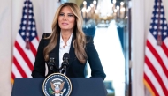 US First Lady Melania Trump speaks about communication with Russian President Vladimir Putin regarding the fate of Ukrainian children, in the Grand Foyer of the White House in Washington, DC, on October 10, 2025. (Photo by Saul Loeb / AFP)