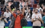 Serbia's Novak Djokovic acknowledges spectators after losing in his men's singles semi-final match against Monaco's Valentin Vacherot on October 11, 2025. (Photo by Hector Retamal / AFP)