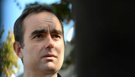 France's Prime Minister Sebastien Lecornu speaks to journalists on October 11, 2025. (Photo by Martin Lelievre / Pool / AFP)