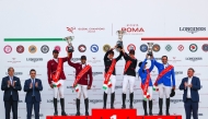 Sheikh Ali Al Khalid Al Thani and Bassem Mohammed of Doha Falcons (left) celebrate on the podium with riders of Cannes Stars and The Paris Panthers.