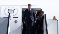 France's President Emmanuel Macron arrives for the Gaza Summit in Sharm El-Sheikh, Egypt on October 13, 2025. (Photo by Yoan Valat / POOL / AFP)