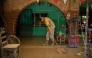 A Mexican Army soldier works to remove the mud from a flooded house due to the heavy rains in the municipality of Alamo, Veracruz, Mexico, on October 12, 2025. Photo by Hector Quintanar / AFP