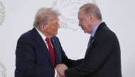 US President Donald Trump and Turkish President Recep Tayyip Erdogan during a summit on Gaza in Sharm el-Sheikh on October 13, 2025. (Photo by Evan Vucci / POOL / AFP)

