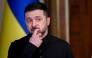Ukraine's President Volodymyr Zelensky reacts as he holds a joint press-conference following talks with High Representative of the European Union for Foreign Affairs and Security Policy in Kyiv on October 13, 2025, amid the Russian invasion in Ukraine.(Photo by Sergei Supinsky / AFP)