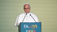 Pope Leo XIV delivers a speech during the World Food Day event in Rome on October 16, 2025. (Photo by Alberto Pizzoli / AFP)