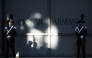 Italian carabinieri stand guard at the Armani Theatre where late Italian fashion designer Giorgio Armani lies-in state, in Milan on September 7, 2025. Photo by Piero CRUCIATTI / AFP

