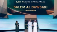 Salem Al Dawsari receives the award from AFC President Salman bin Ibrahim Al Khalifa.