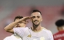 Al Arabi's Pablo Sarabia celebrates after scoring his team's fourth goal.