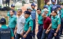 Police personnel escort detained army officers to the International Crimes Tribunal court in Dhaka on 22 October 2025. Photo by AFP