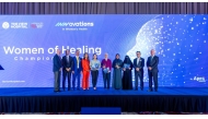 The View Hospital CEO Dr. Fatih Mehmet Gul and other officials with award recipients at the symposium.