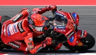 Ducati Lenovo Team's Spanish MotoGP rider Marc Marquez rides during the warm-up ahead of the MotoGP Indonesian Grand Prix at the Mandalika International Circuit in Mandalika, West Nusa Tenggara on October 5, 2025. (Photo by SONNY TUMBELAKA / AFP)

