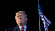 US President Donald Trump speaks to the media as he walks to Marine One prior to departure from the South Lawn of the White House in Washington, DC, October 24, 2025. (Photo by Saul Loeb / AFP)