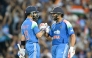 India's Rohit Sharma (R) and Virat Kohli celebrate their win at the Sydney Cricket Ground in Sydney on October 25, 2025. (Photo by Saeed Khan / AFP) 