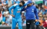 A medical team member helping Iyer off the pitch. Photo/BCCI