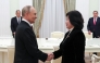 In this pool photograph distributed by the Russian state agency Sputnik, Russia's President Vladimir Putin meets with North Korean Foreign Minister Choe Son-hui in Moscow on October 27, 2025. (Photo by Vyacheslav PROKOFYEV / POOL / AFP)