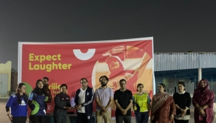 PISQ Principal Ch. Muhammad Afzal with staff and players at the event.