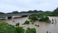 The Rio Cobre comes out of its banks near St. Catherine, Jamaica, on October 28, 2025. (Photo by Ricardo Makyn / AFP)
