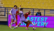Action during the QSL Cup Round 4 match between Muaither SC and Umm Salal.
