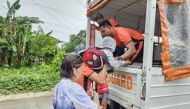The Philippine Coast Guard personnel assisting in evacuating residents in Guiuan town, ahead of the landfall of Typhoon Kalmaegi. Photo by handout / Philippine Coast Guard station / AFP 