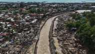 This aerial photo shows damaged houses in the aftermath of Typhoon Kalmaegi in Talisay, in Cebu province on November 5, 2025. Photo by Jam STA ROSA / AFP