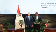Prime Minister of Egypt H E Dr. Mostafa Madbouly (centre) with Minister of Municipality and Chairman of Qatari Diar H E Abdullah bin Hamad bin Abdullah Al Attiyah (left), and Egypt's Minister of Housing, Utilities and Urban Communities H E Eng. Sherif El Sherbiny during the signing ceremony.