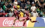 Qatar's Yazan Mohamed (left) celebrates with teammate Adam Friakh after scoring a goal against South Africa. 