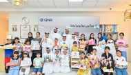 QNB Officials with participants during 'The Junior Entrepreneur' programme.