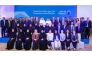 Ahlibank officials with its long-serving employees at the award ceremony.