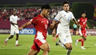 Indonesia's Nazriel Alvaro (left) vies for the ball with Honduras' Marcos Reyes.