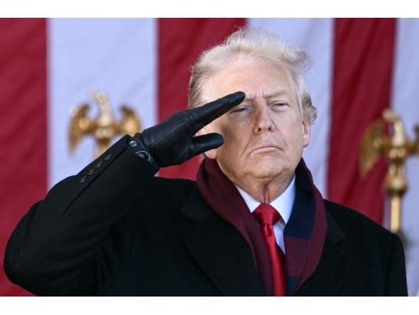 US President Donald Trump salutes at the conclusion of a Veterans Day ceremony at Arlington National Cemetery in Arlington, Virginia on November 11, 2025. (Photo by Brendan Smialowski / AFP)