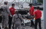 Rescuers transfer a victim's body following a migrant boat incident in Kedah state, Malaysia, Nov. 10, 2025. (Malaysian National News Agency/Handout via Xinhua)
