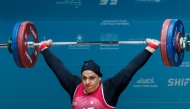 Ouisal Ikhlef competes during the Women’s +86kg weightlifting final.