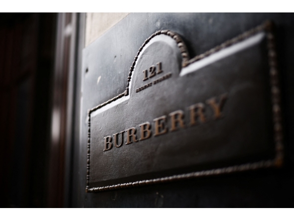 This photograph taken on September 2, 2024 shows the entrance plaque of the British fashion label Burberry outside the store in central London. Photo by HENRY NICHOLLS / AFP