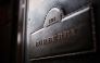 This photograph taken on September 2, 2024 shows the entrance plaque of the British fashion label Burberry outside the store in central London. Photo by HENRY NICHOLLS / AFP