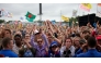 Festival goers attend concerts at the Pyramid Stage during the third day of the Glastonbury Festival of Contemporary Performing Arts near Glastonbury, southwest England, on June 28, 2013. Photo by ANDREW COWIE / AFP