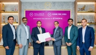 Vice Chairman of Malabar Group, Abdul Salam K.P, handing over the Letter of Intent to Consul General of Ethiopia in Dubai, H E Asmelash Bekele in the presence of other officials.