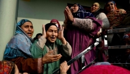 Relatives of the victims who died in an accidental blast at Nowgam police station, mourn in their house on the outskirts of Srinagar, on November 15, 2025. (Photo by Tauseef Mustafa / AFP)