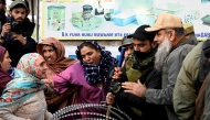 Relatives of the victims who died in an accidental blast at Nowgam police station, scuffle with security personnel whilst demanding bodies of the deceased, on the outskirts of Srinagar, on November 15, 2025. (Photo by Tauseef MUSTAFA / AFP)
 

