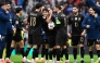 Portugal players celebrate after the 2026 World Cup qualifiers Europe zone group F football match between Portugal and Armenia, at Dragao stadium in Porto on November 16, 2025. Portugal won 9-1. (Photo by Miguel RIOPA / AFP)