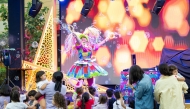 Children watching a performance at the Medina Centrale Carnival.
