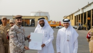 Assistant Undersecretary for Public Services Affairs at the Ministry of Municipality Eng Abdullah Ahmed Al-Karani (right) with other officials during the event.